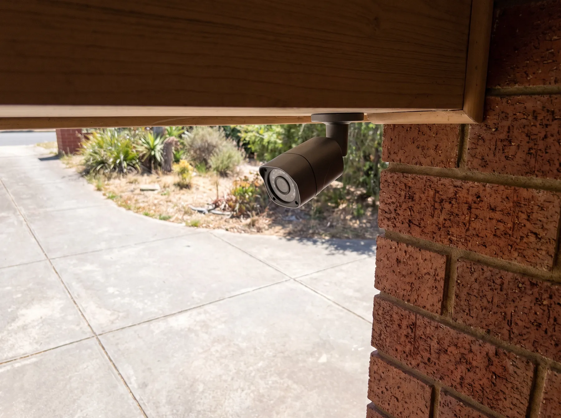 Exterior CCTV camera on a suburban eave